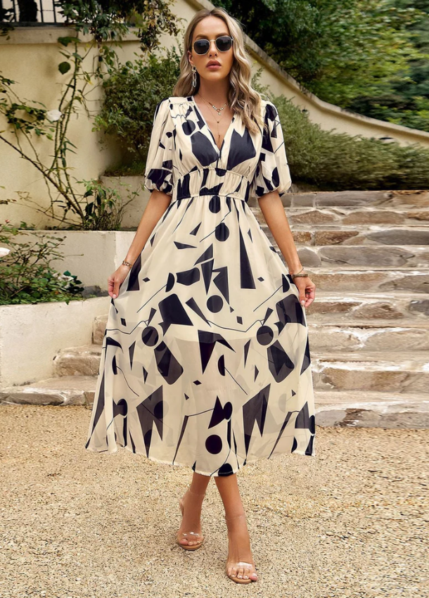Estella | Flatterende Bloemen Midi Jurk