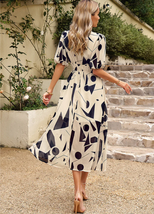 Estella | Flatterende Bloemen Midi Jurk