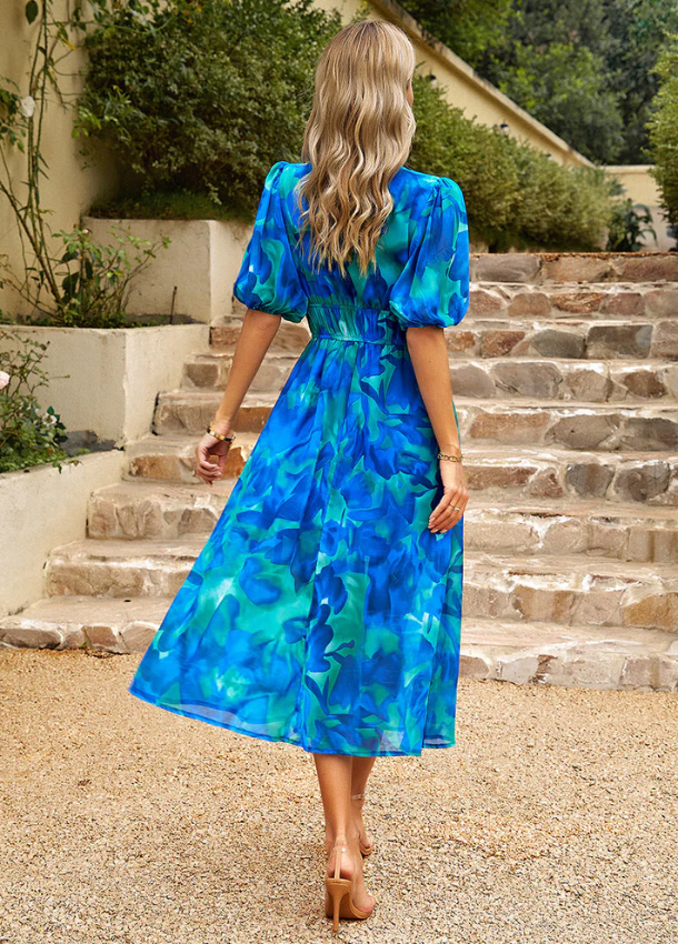 Estella | Flatterende Bloemen Midi Jurk